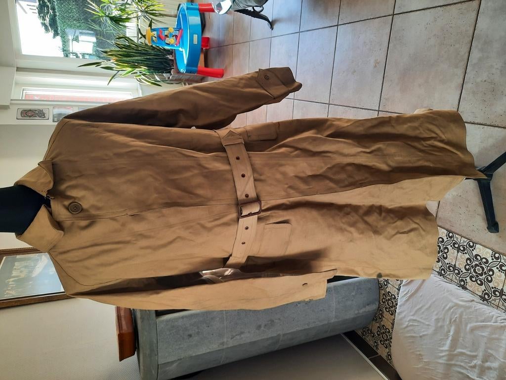 Manteau Mc Intoch 1945, Collections, Enlèvement