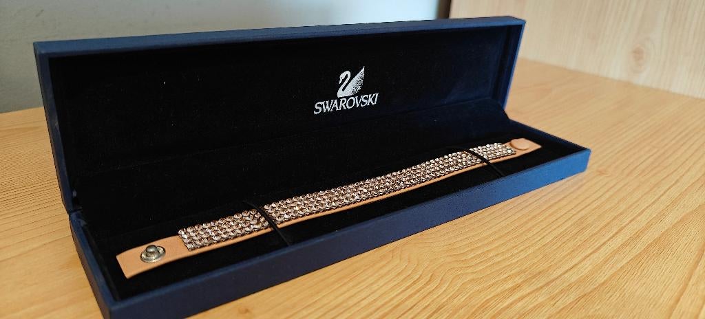 Bracelet beige clair Swarovski, Enlèvement, Comme neuf, Bijou ou Montre