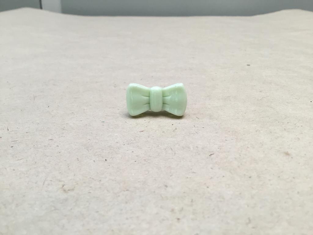 Ring in de vorm van een strikje, Handtassen en Accessoires, Ringen, Kunststof, Ophalen of Verzenden, Zo goed als nieuw, Dame