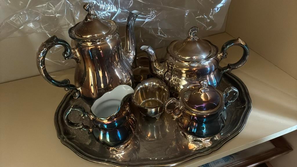 Zilveren thee servies afgewerkt met porselein alen s, Ophalen