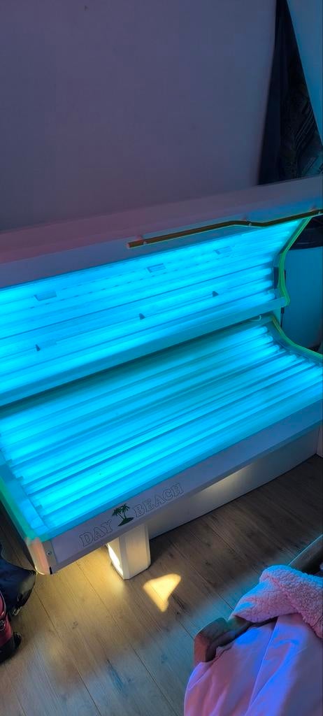 Zonnebank met Gezichtsbruiner, Ophalen