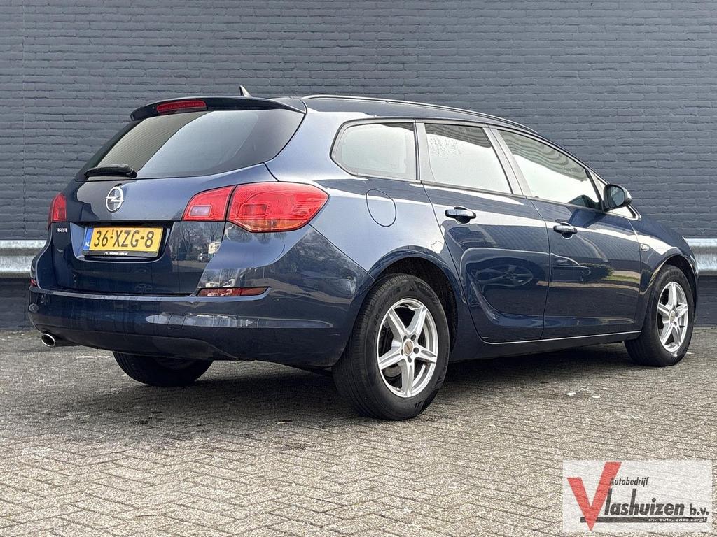 Opel Astra Sports Tourer 1.4 Turbo Edition | Airco | Cruise, Auto's, 144 g/km, Zwart, Blauw, Bedrijf