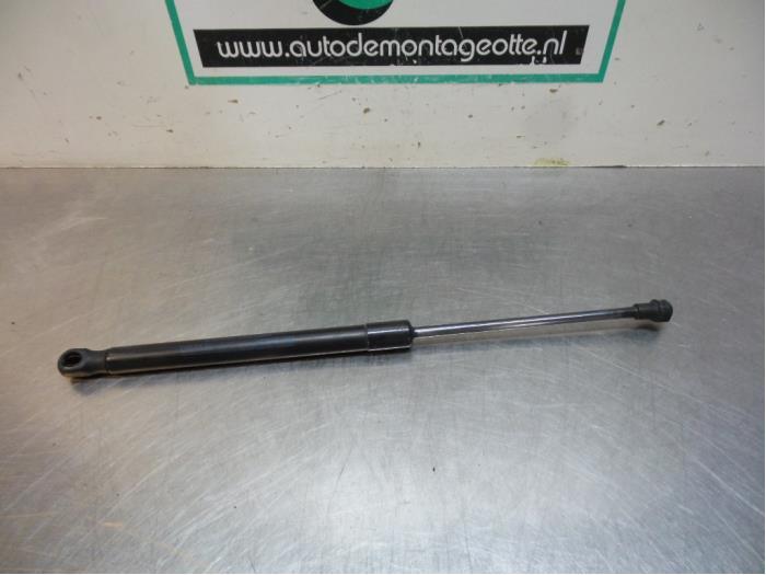 Amortisseur capot moteur gauche d'un Volkswagen Caddy (Caddy, Volkswagen, -, 3 mois de garantie, Utilisé