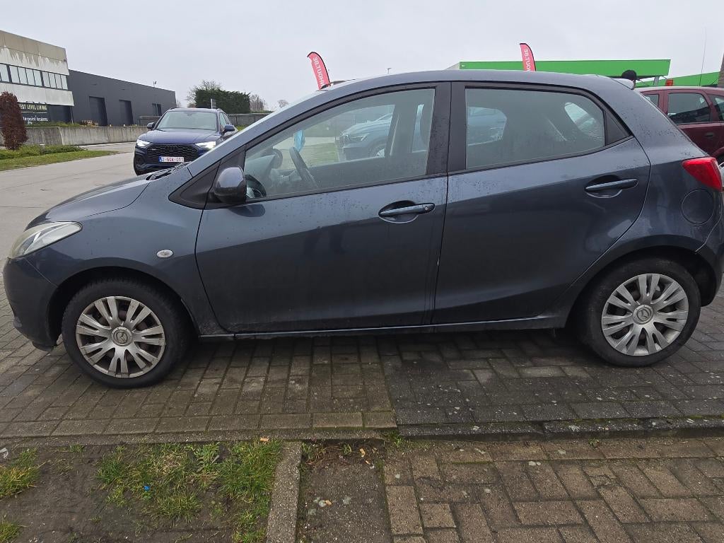 Mazda 2 1.4d 2009 205.000 km Airco Export, Auto's, Mazda, 50 kW, Zwart, Blauw, Bedrijf