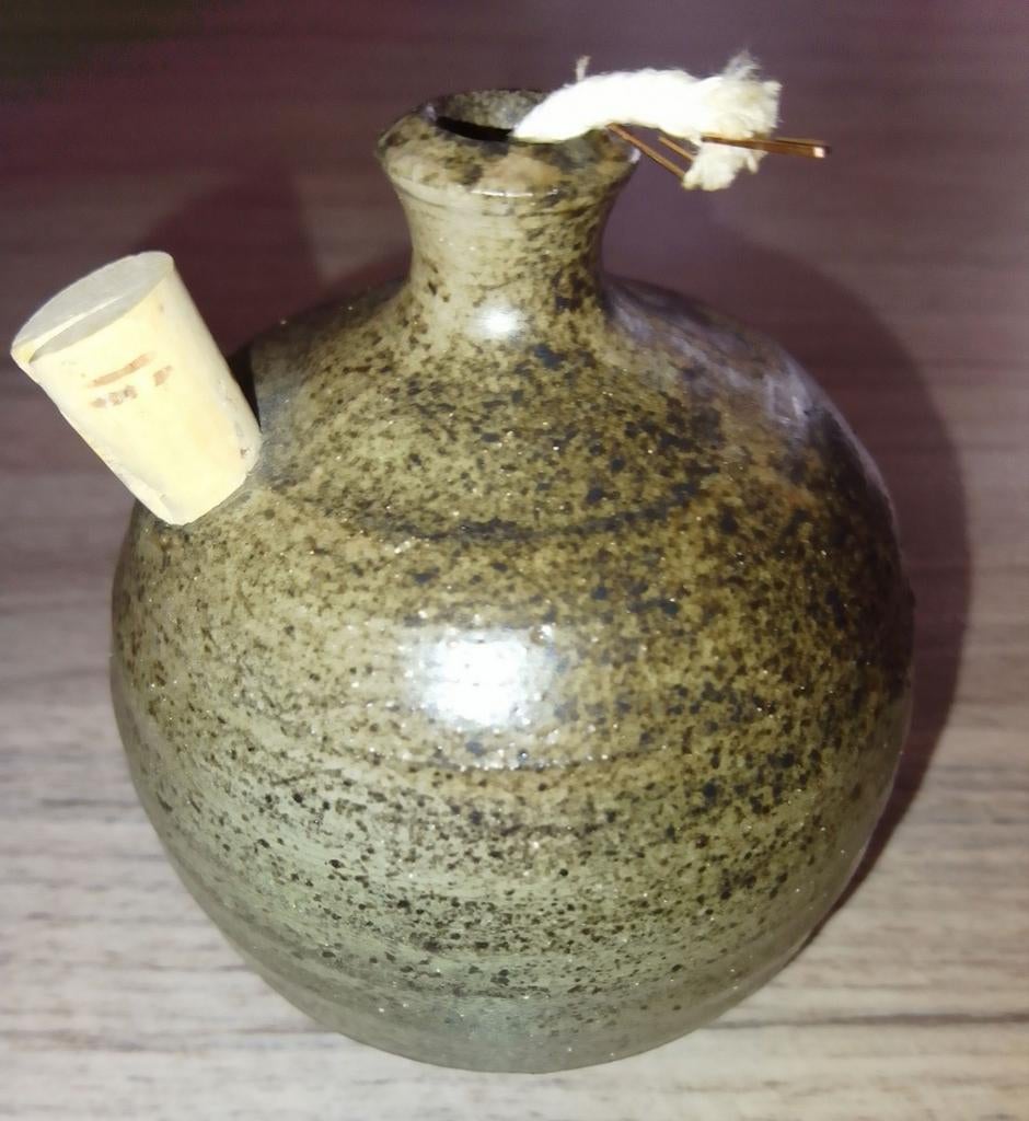 Handgedraaid olielampje van Paul Van Gompel, Ophalen