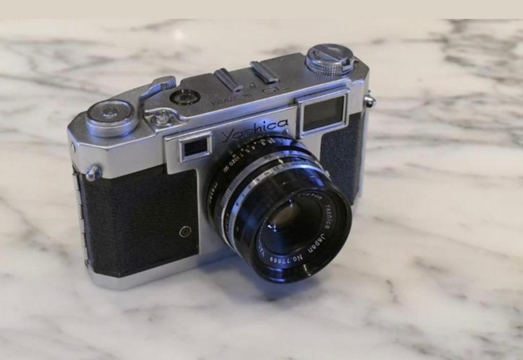 Yashica 35 met 4.5cm/2.8 en lichtmeter., Ophalen of Verzenden, 1940 tot 1960, Fototoestel