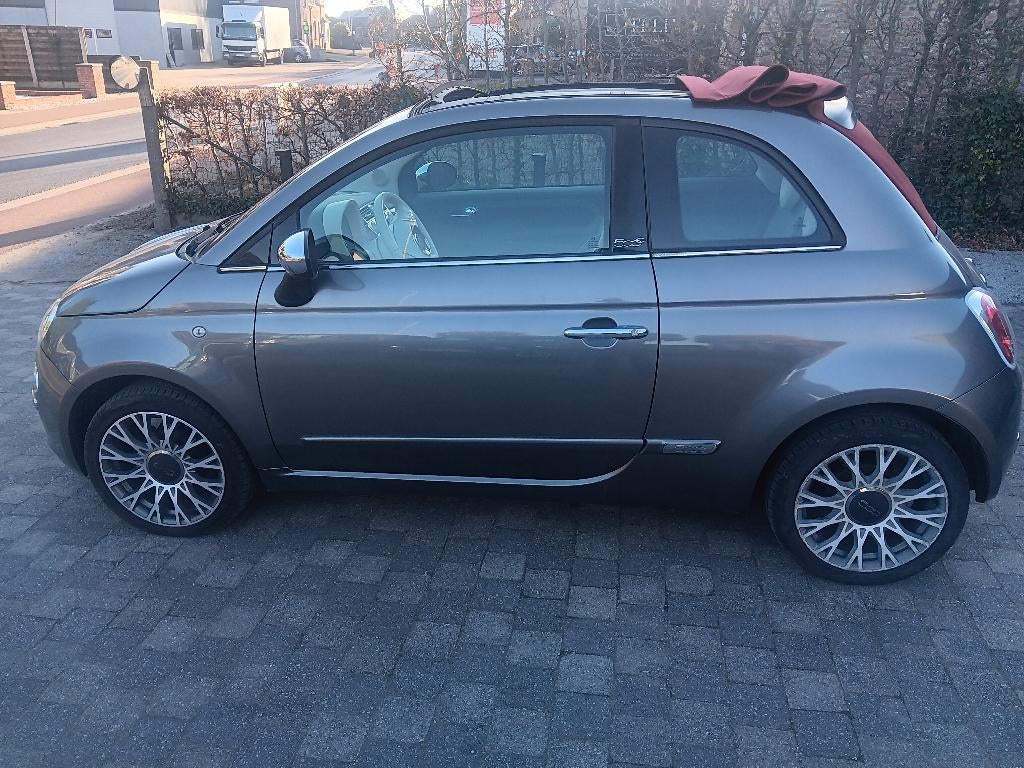 Fiat 500 cabrio 1.2 benzine met airco en garantie, Auto's, Fiat, Voorwielaandrijving, 4 cilinders, Cabriolet, Leder en Stof