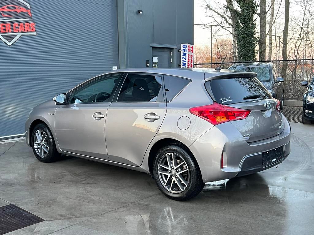 Toyota Auris 1.8i HYBDRID Camera 1SteEigenaar CruiseCntr, Autos, Toyota, Cuir, Argent ou Gris, Achat, Euro 6