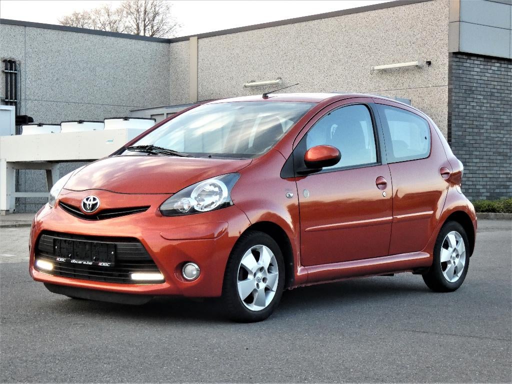 Toyota Aygo 1.0 VTT-i Orange Spice Airco !, Auto's, Toyota, Voorwielaandrijving, Euro 5, Stof, Overige kleuren