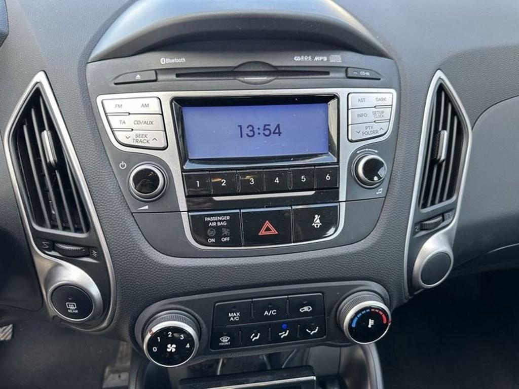 Hyundai ix35 1.6i Gdi UEFA edition 2WD 97135 km ,Trekh,Airc, Auto's, Hyundai, 135 pk, 158 g/km, Zwart, Bedrijf