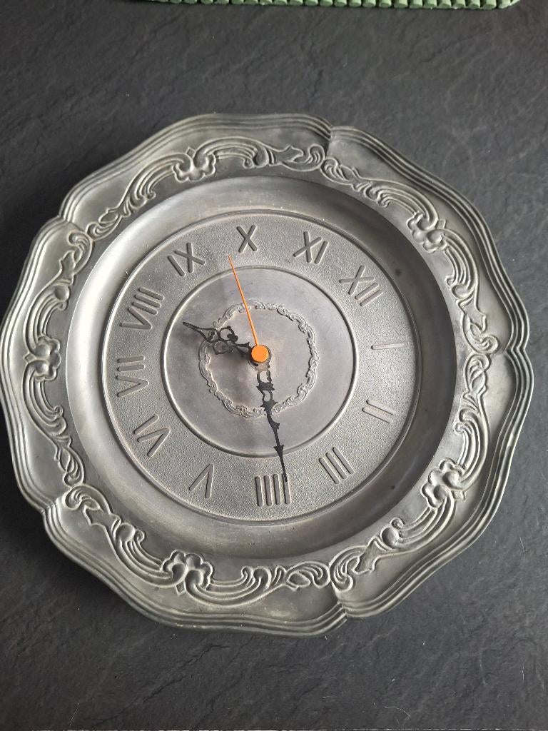 Tinnen klok, Ophalen