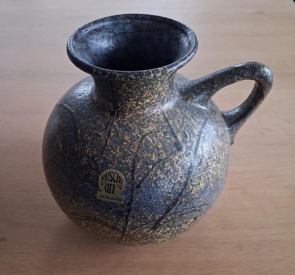 Ruscha keramiek vaas, Enlèvement