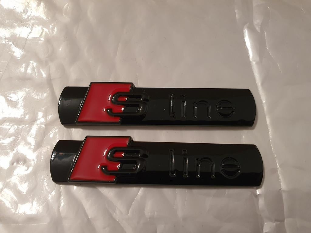 2x audi sline spatbord zijkant logo's, Ophalen of Verzenden