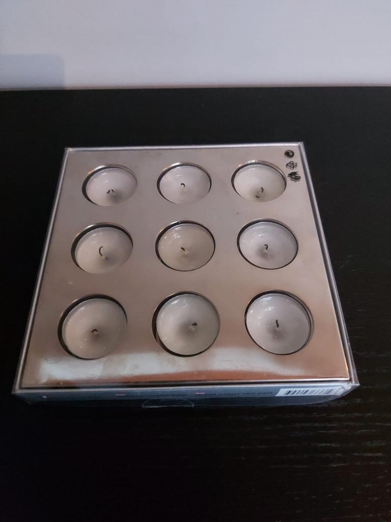 theelichthouder, Ophalen, Zo goed als nieuw