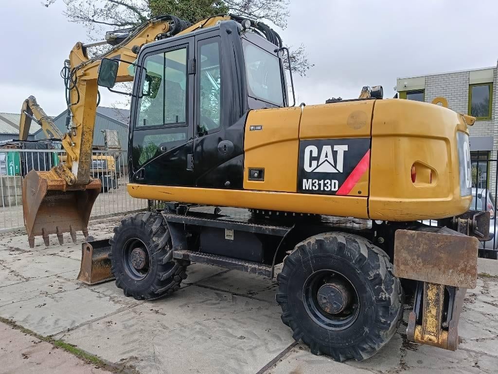 Cat M 313 D mobile excavator bagger graafmachine 15T, Articles professionnels, Excavatrice