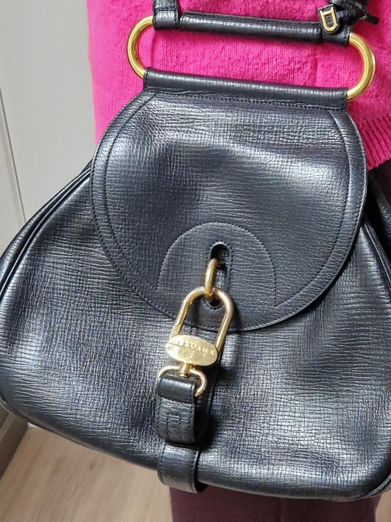 Delvaux handtas, Ophalen