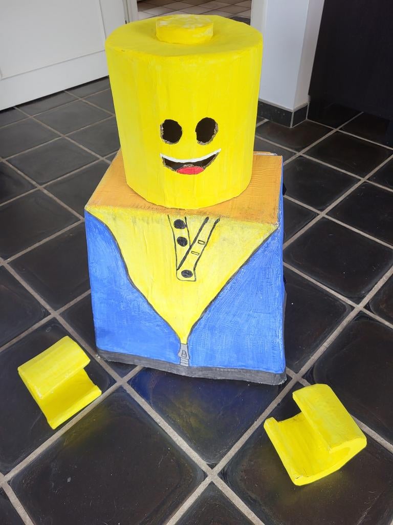 Vrolijk Lego-kostuum, Ophalen