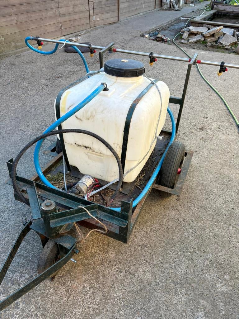 Sproeier voor zitmaaier of tuintractor, Ophalen