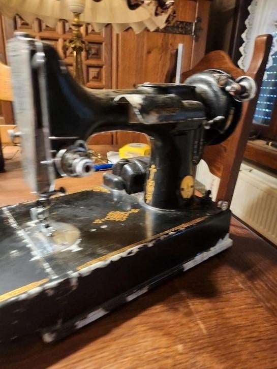 Antieke Singer naaimachientje met koffer en toebehoren, Enlèvement