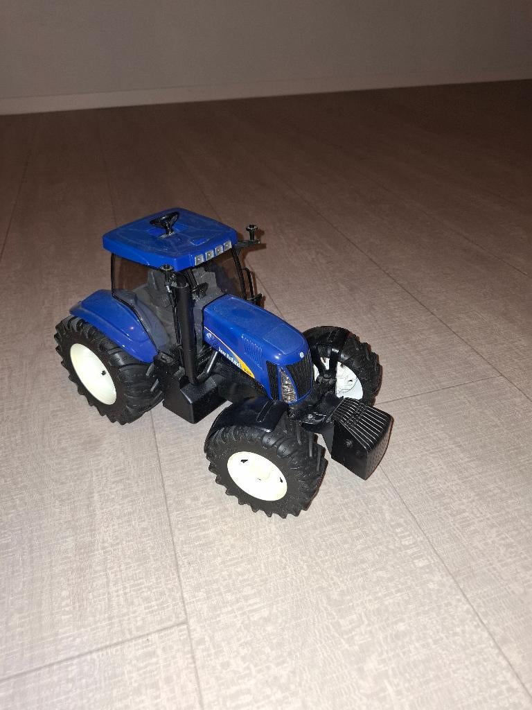 Bruder tractor New Holland T8040, Kinderen en Baby's, Ophalen