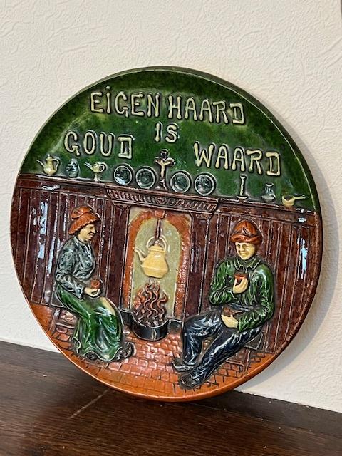 Bord Vlaams aardewerk Eigen haard is goud waard, Ophalen