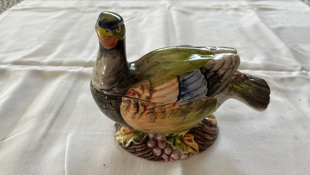 Porseleinen eendje, Ophalen