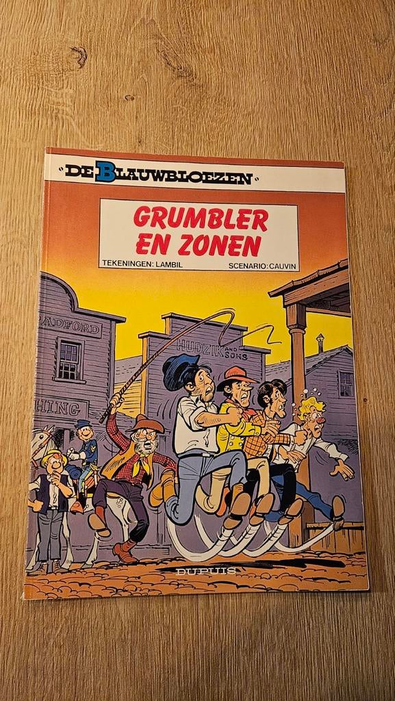 Strip De Blauwbloezen - Grumbler en Zonen (nr.33), Cauvin / Lambil, Eén stripboek, Ophalen of Verzenden, Zo goed als nieuw