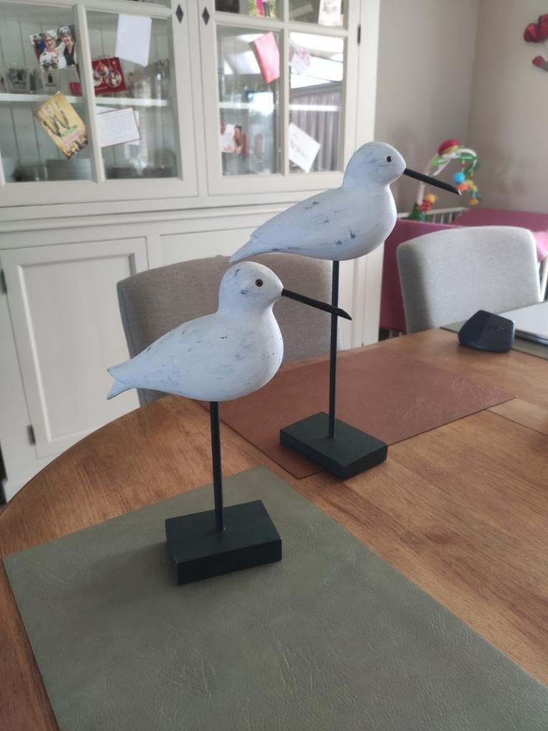 2 houten meeuwen, Ophalen