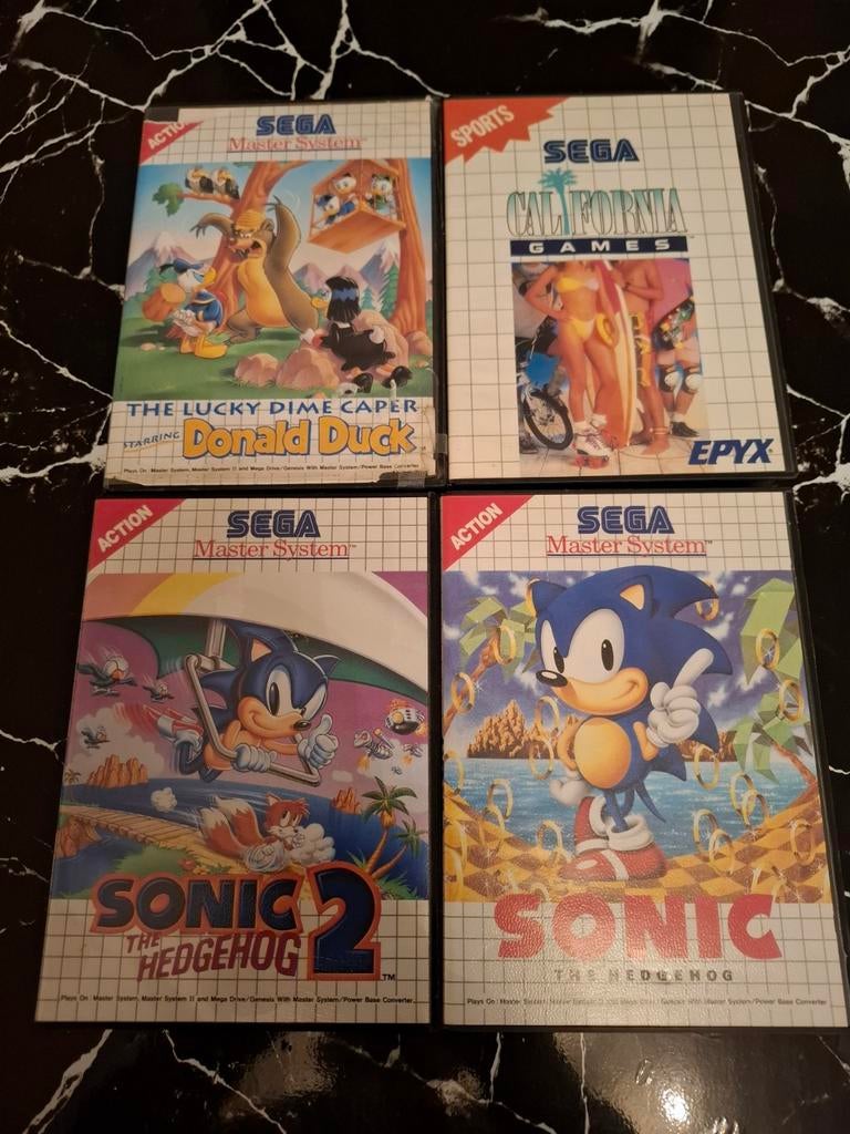 4 Sega Master System-spellen in een doos!, Ophalen of Verzenden, Master System