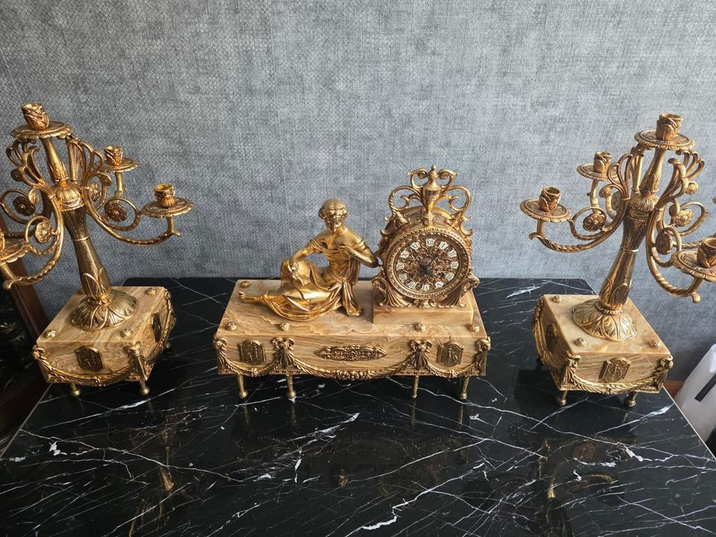 Orgolu schouw klok verguld bronz, Ophalen