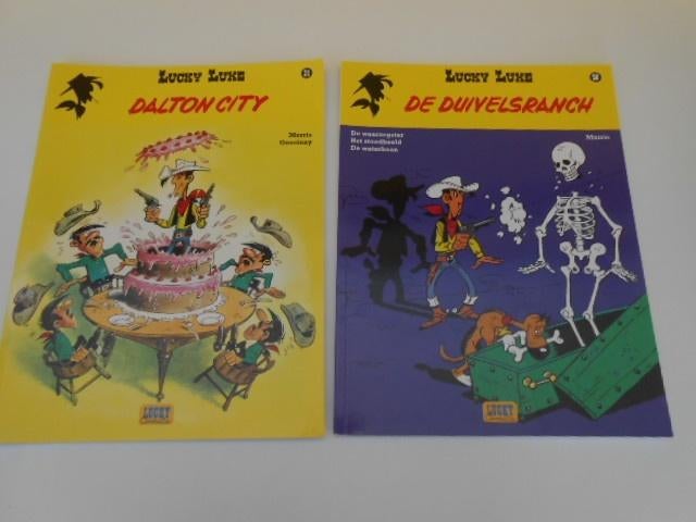 strips Lucky Luke 2 stuks nr 34 en nr 58, Meerdere stripboeken, Ophalen of Verzenden, Gelezen, Morris / Goscinny