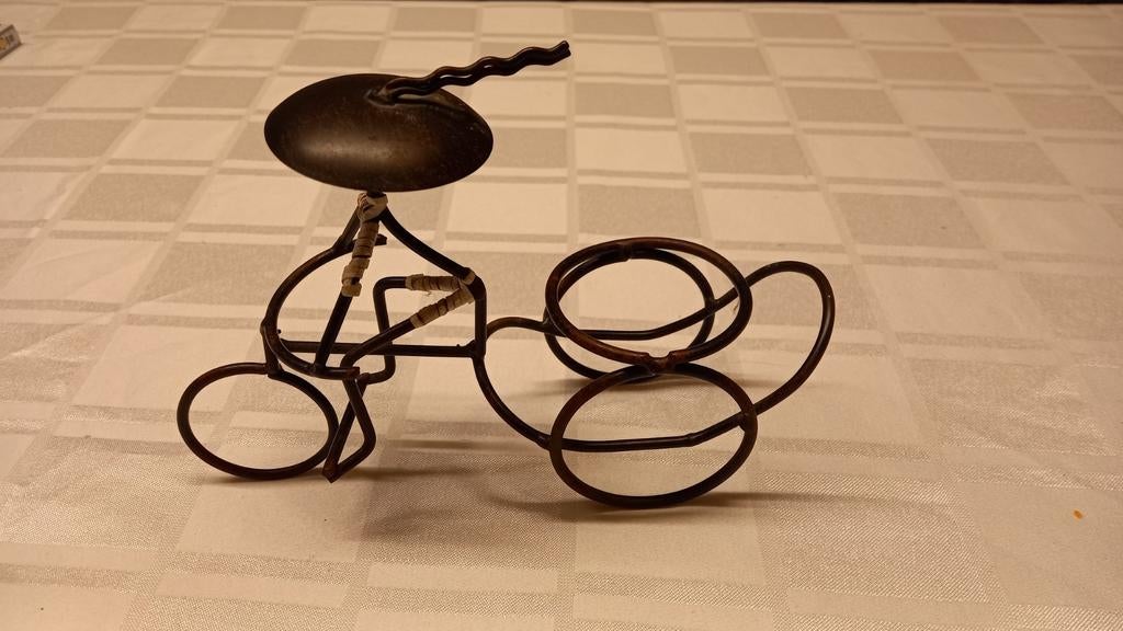 Metalen decoratiestuk fietser, Ophalen