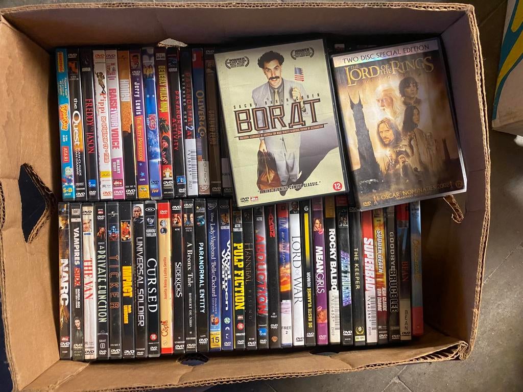 Boîte de 74 DVD originaux - films divers, Tous les âges, Enlèvement, Comme neuf