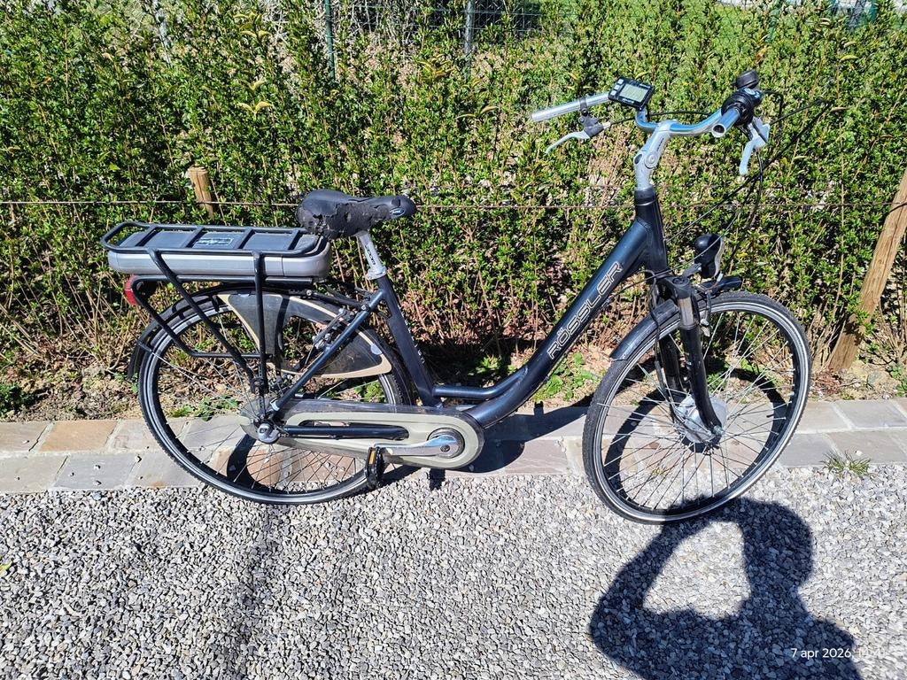 Kapotte elektrische damesfiets, Enlèvement