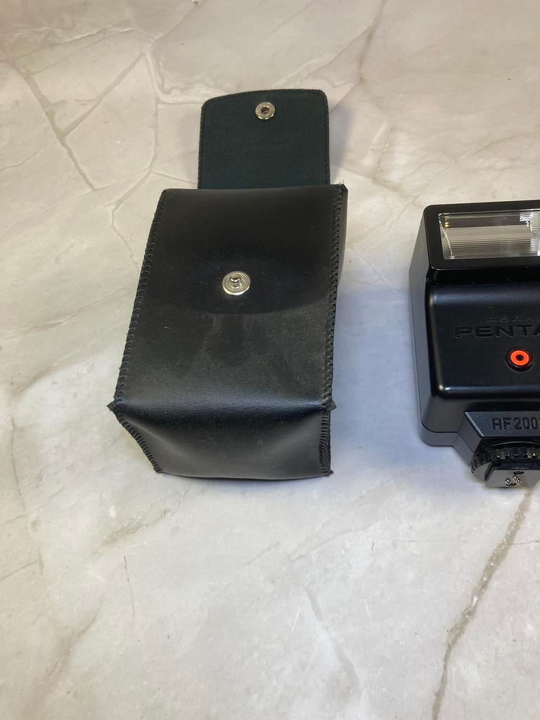 Flash électronique Pentax AF200S avec étui en cuir d'origine, Enlèvement ou Envoi, Comme neuf, Pentax