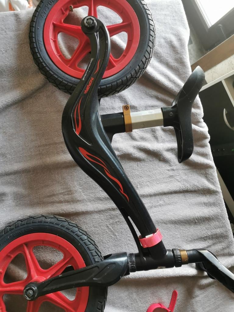 Loopfiets fluovest gratis, Enlèvement