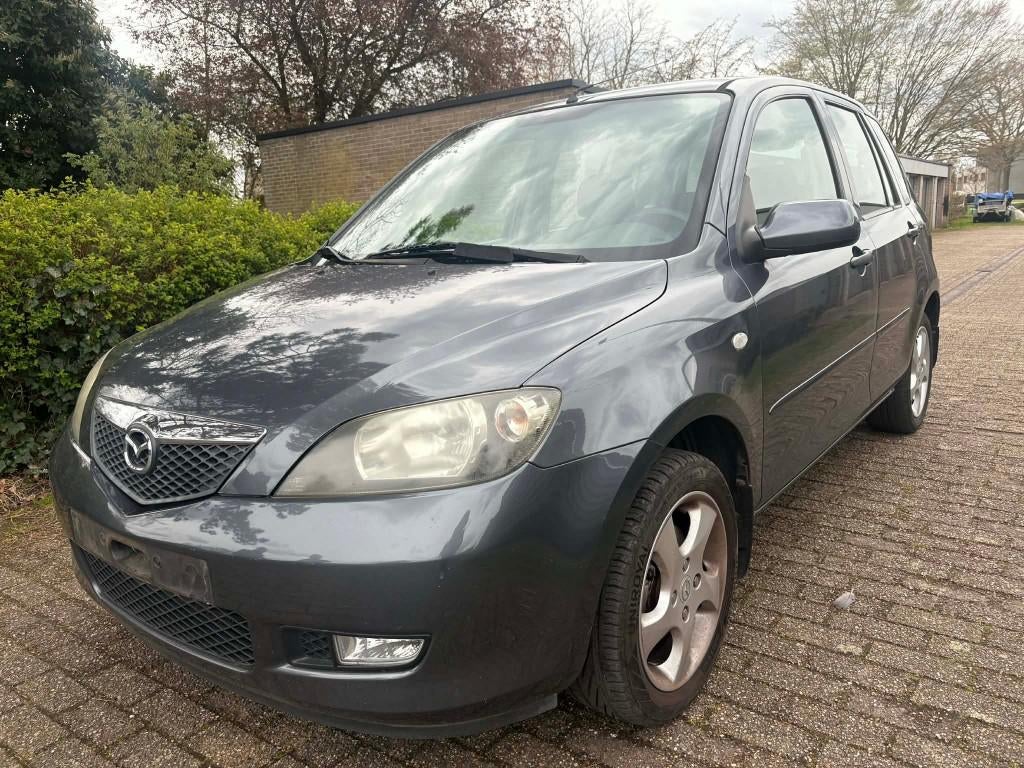 Mazda 2 1.4 benzine met keuring Euro4, Autos, Mazda, Boîte manuelle, Autres couleurs, Noir, 5 portes