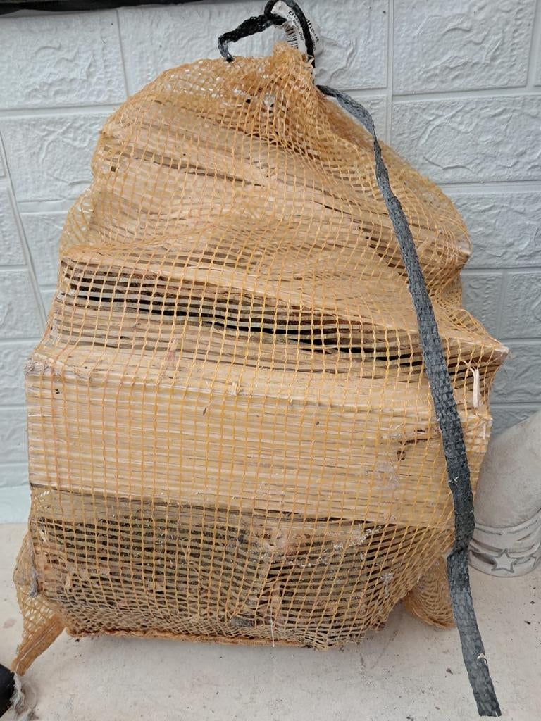 Sac de bois de chauffage neuf (bois dur), Enlèvement