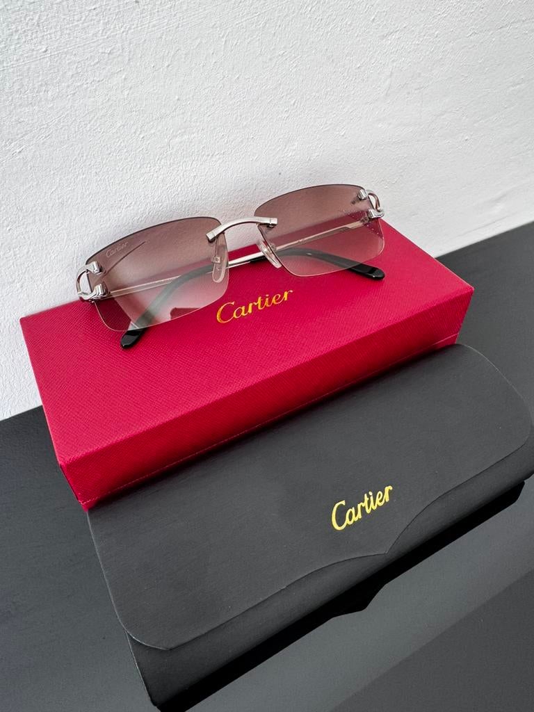 Cartier zonnebril, Ophalen of Verzenden, Zo goed als nieuw, Zonnebril