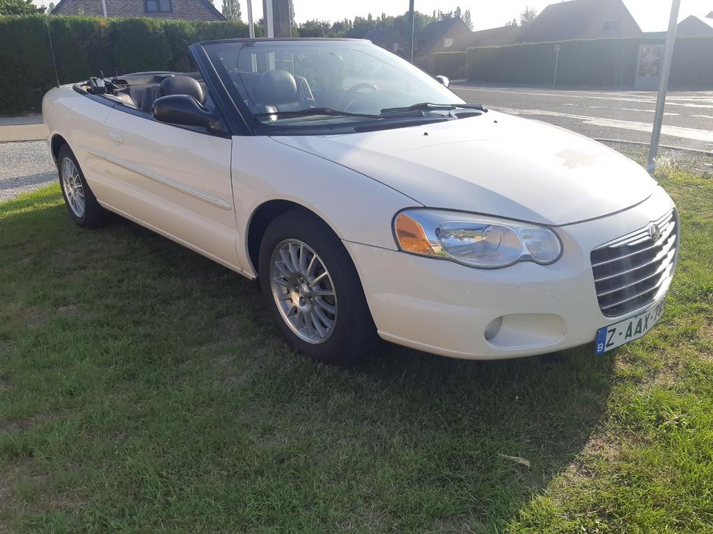 Chrysler sebring cabriolet 2.7l superbe., Auto's, Chrysler, Lederen bekleding, Cabriolet, Alcantara, Bedrijf