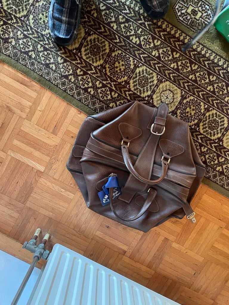 Lederen reistas, Ophalen, Zo goed als nieuw