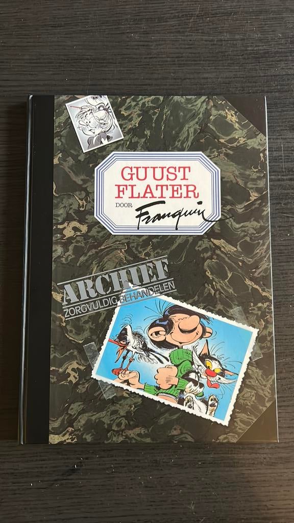 Guust Flater – Archief: Zorgvuldig Behandelen (Hardcover), Boeken, Ophalen of Verzenden, Zo goed als nieuw