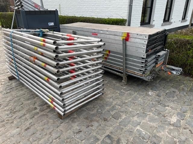 100m2 aluminium Altrad kaderstelling in nieuwstaat, Doe-het-zelf en Bouw, Steigers, Ophalen, Zo goed als nieuw, Gevelsteiger, 5 meter of hoger