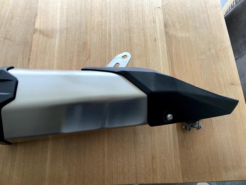 Kawasaki uitlaat, Enlèvement, Neuf