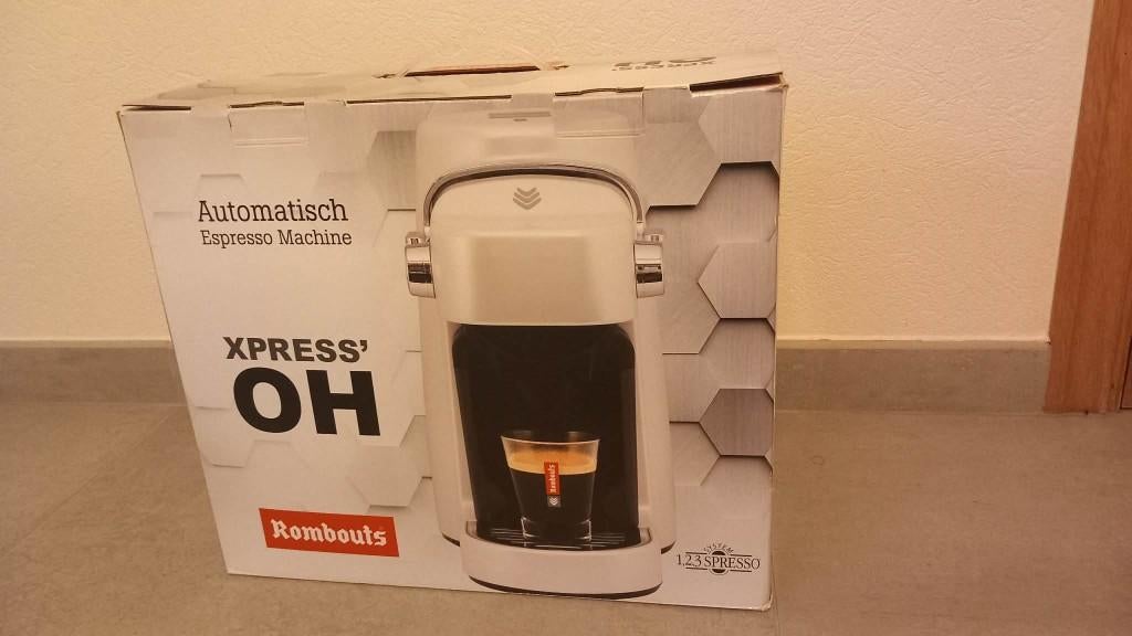 Te koop: gloednieuwe koffiemachine Rombouts (Xpress' OH), Enlèvement, Neuf, Cafetière, Dosettes et capsules de café