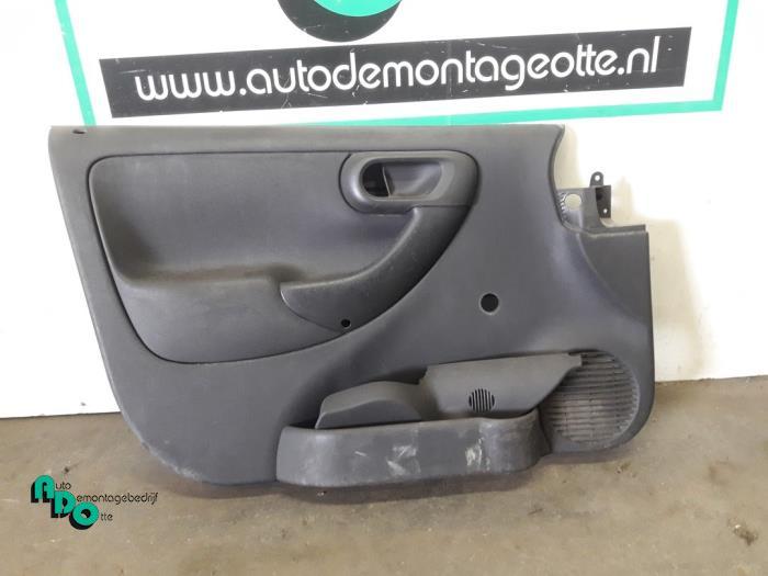Revêtement portière 2portes gauche d'un Opel Combo (Combo, -, Opel, 3 mois de garantie, Utilisé