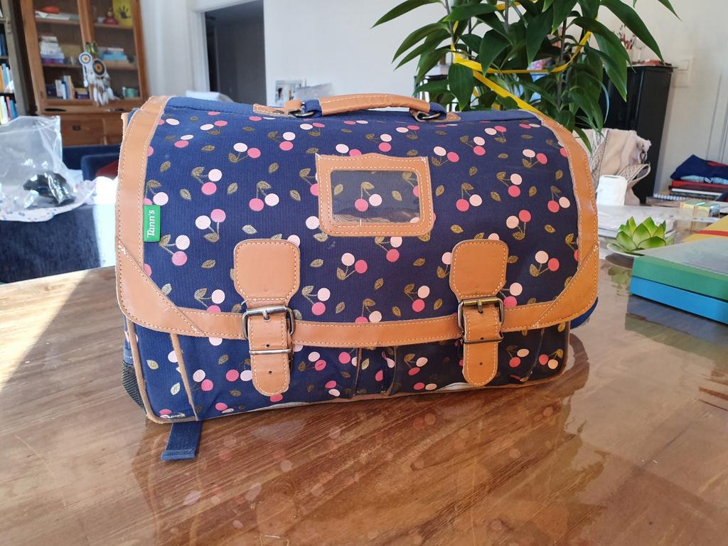 Boekentas Tann's lagere school, Ophalen