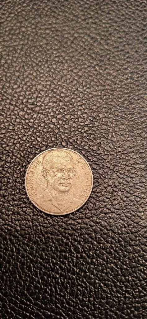 Zaïre 10 makuta 1976, Enlèvement ou Envoi