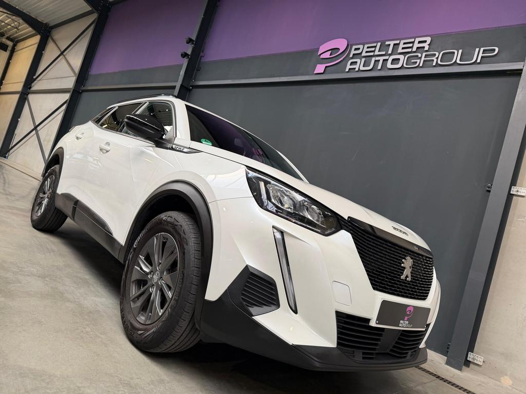 Peugeot 2008 1.2 PureTech Style Automaat GPS Apple CarPlay, Auto's, Peugeot, 1199 cc, 0 kg, Wit, Bedrijf