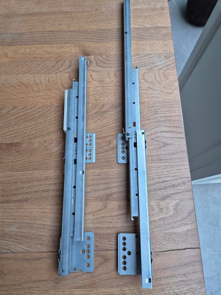 Ladegeleiders keukenkast, Ophalen